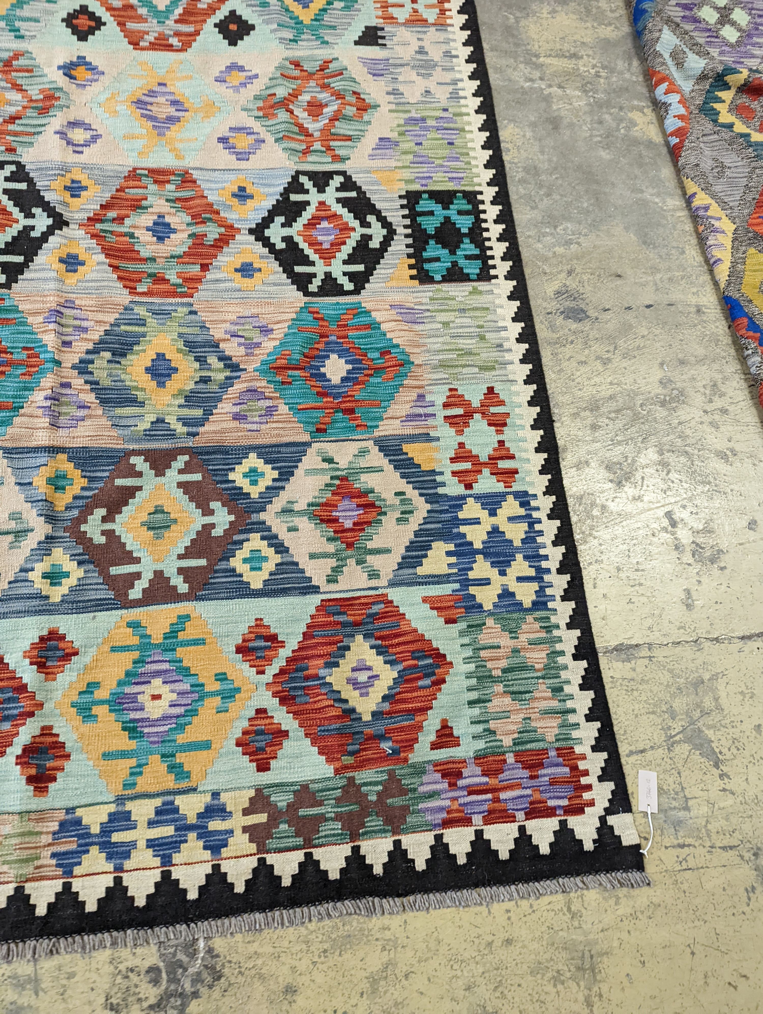 An Anatolian contemporary Kelim polychrome flatweave carpet, 300 x 204cm